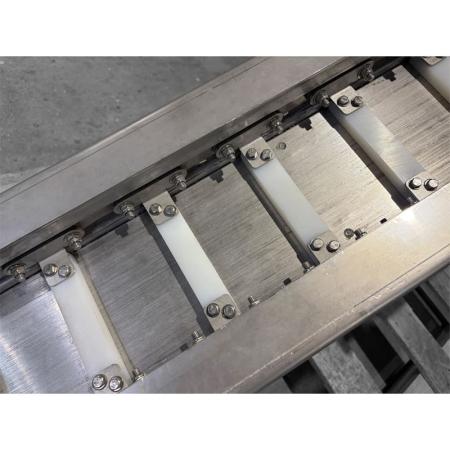 Devis Convoyeur à raclettes pour l'évacuation de minerais